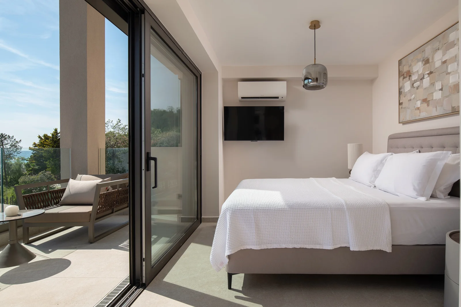 The gallery suite with floor-to-ceiling sea views